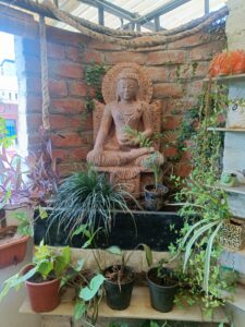 Buddha Statue in Balcony Corner Oxygen Garden